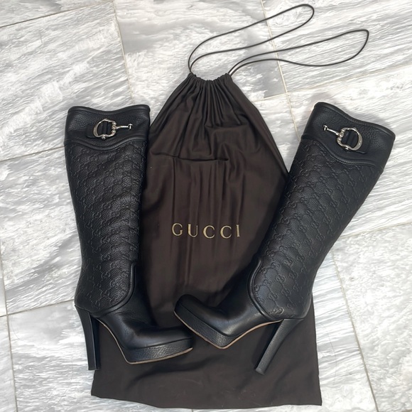 Vintage Knee-high Guccissima platforms in black leather.